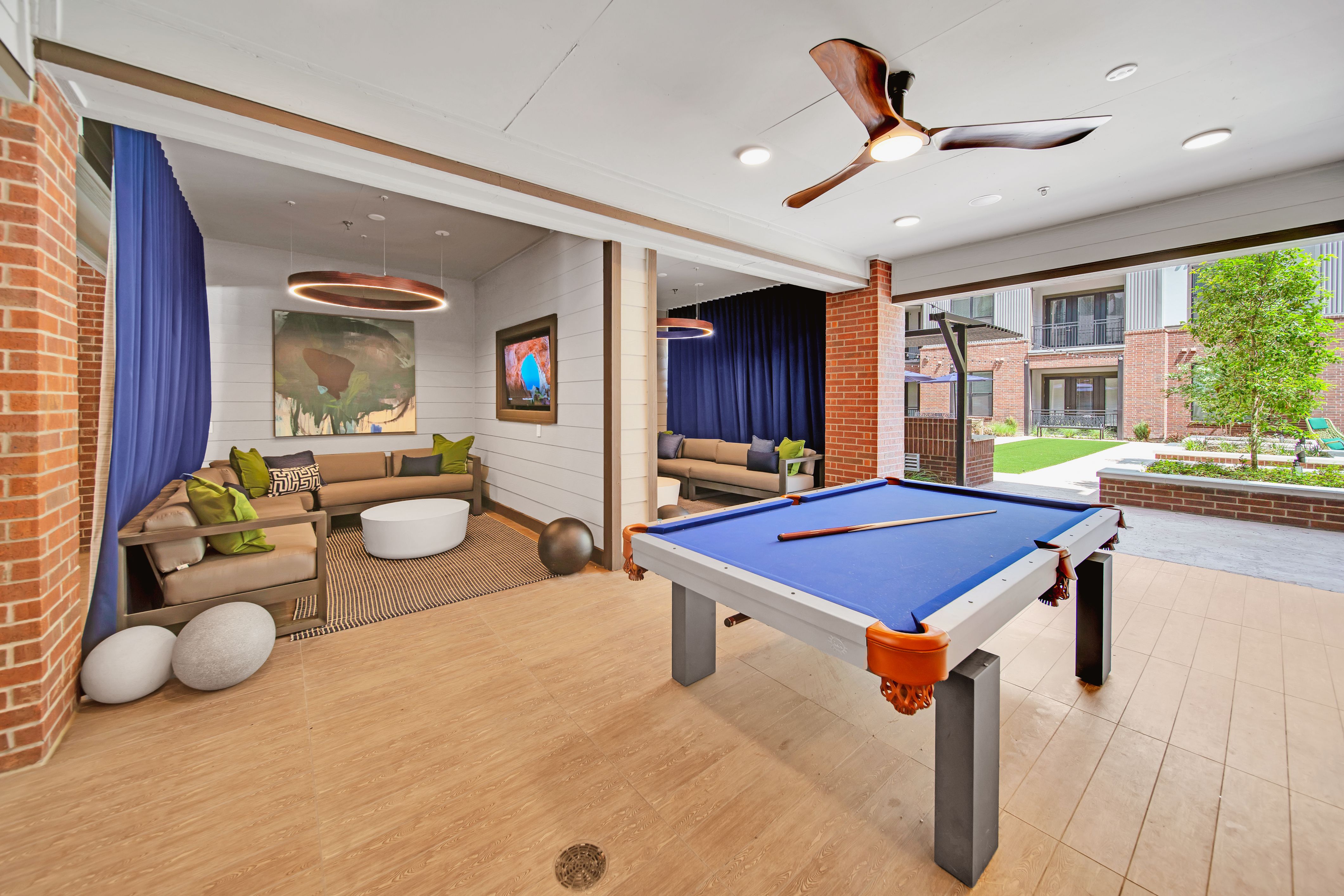 Pool table and lounge areas at Taylor Heights